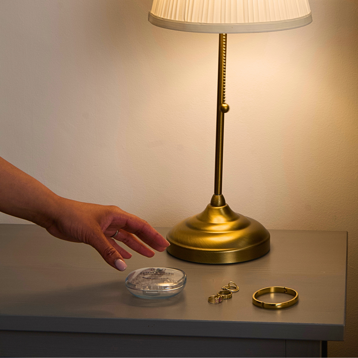 Clear dental retainers stored in a protective bedside case
